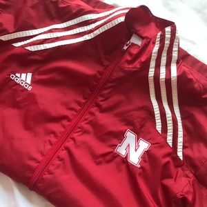 Red and white adidas and NE zip up jacket